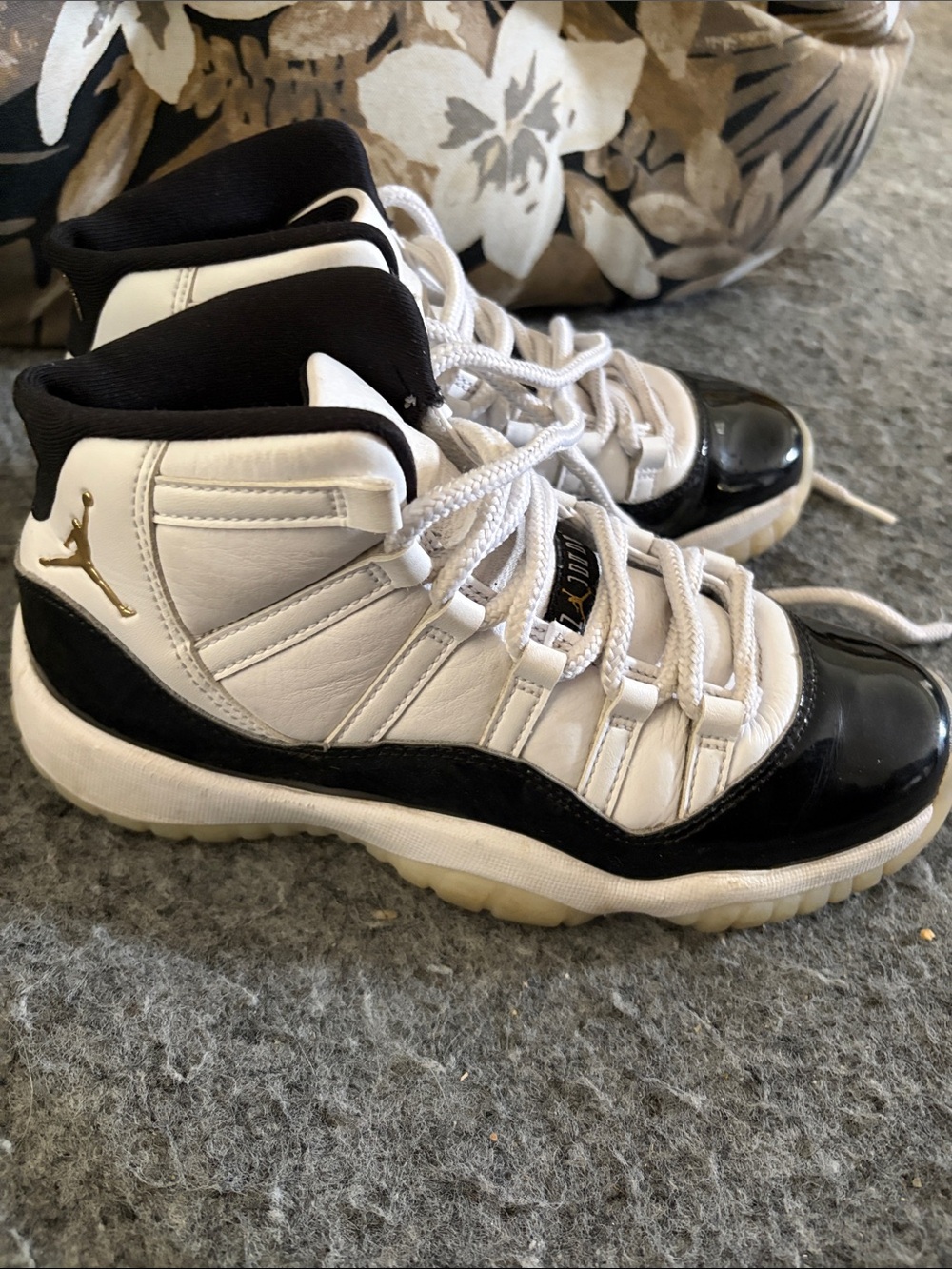 Jordan 11 big Kid White and wBlack High-Top Sneakers with Gold Jumpman
